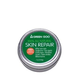 Eco friendly Green Goo brand all natural skin repair herbal salve in reusable round tin container with green label.