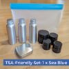 View of 3-1-1 leak proof, clear quart bag with blue seal and travel toiletry container set