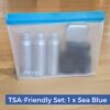 View of reusable, clear TSA friendly travel toiletry container set packed in leak-proof silicone, stand-up bag