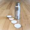 Eco-friendly hemp and recycled paper labels for TSA friendly travel toiletry aluminum bottle