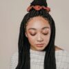 Woman with fair-trade, artisan-made scrunchie in hair