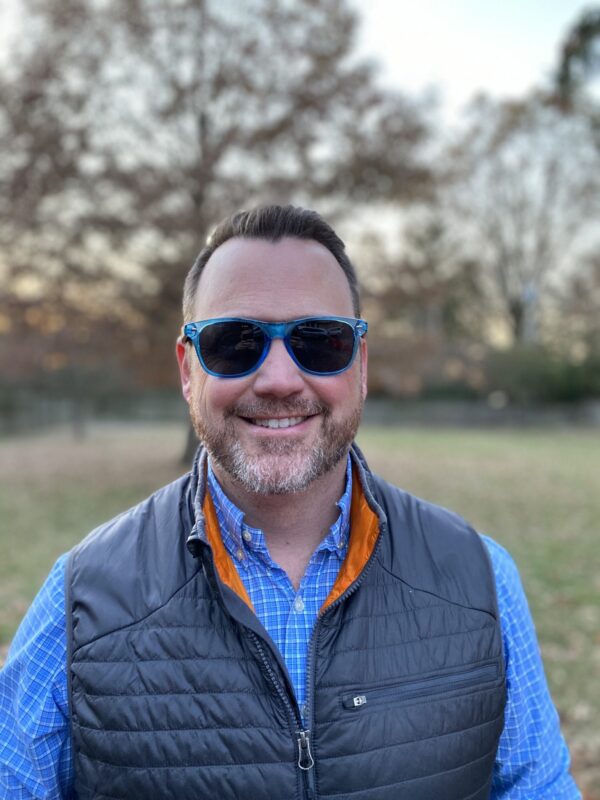 Guy wearing eco friendly Blue Planet sunglasses.