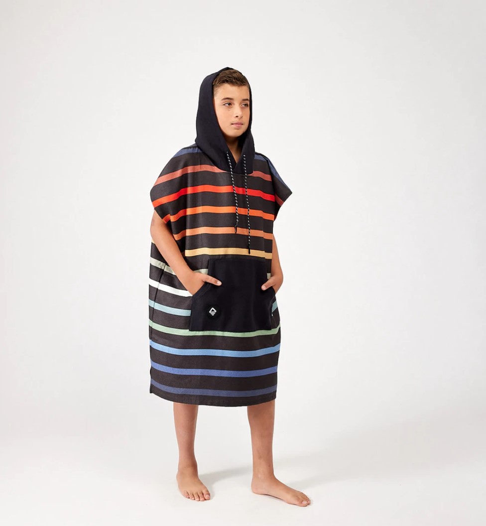 Young boy in kids changing poncho Pinstripe Multi for beach, camping and outdoor travel