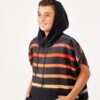 Young boy with hood of quick dry changing poncho in Pinstripes Multi for sustainable travel