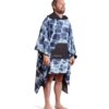 Man wearing eco-friendly Agua Blue Poncho Towel from Nomadix