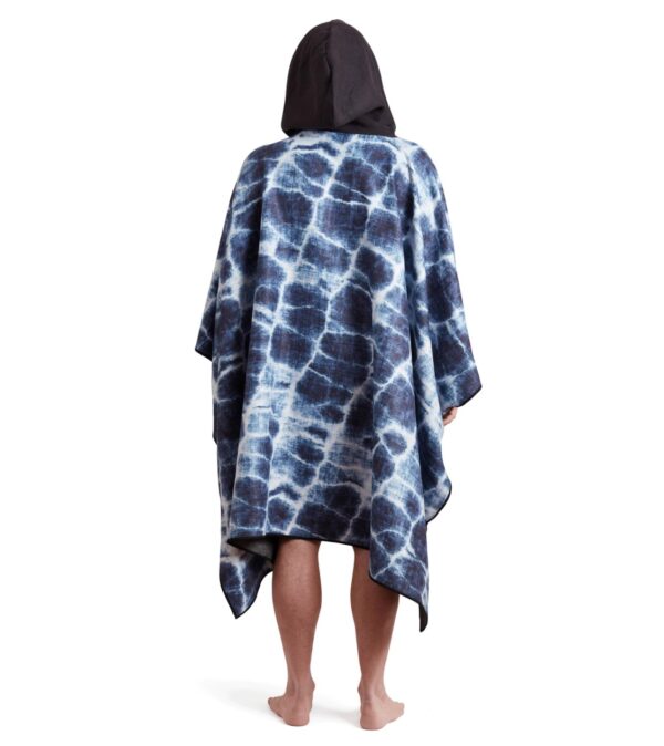 Backside view of man in eco-friendly Agua Blue Poncho Towel for camping, swimming and more