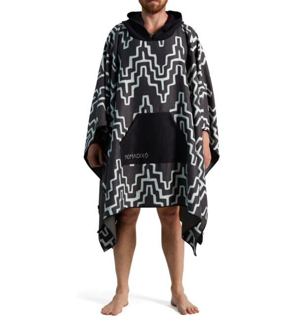 Man wearing Teton Black quick dry Poncho Towel from Nomadix