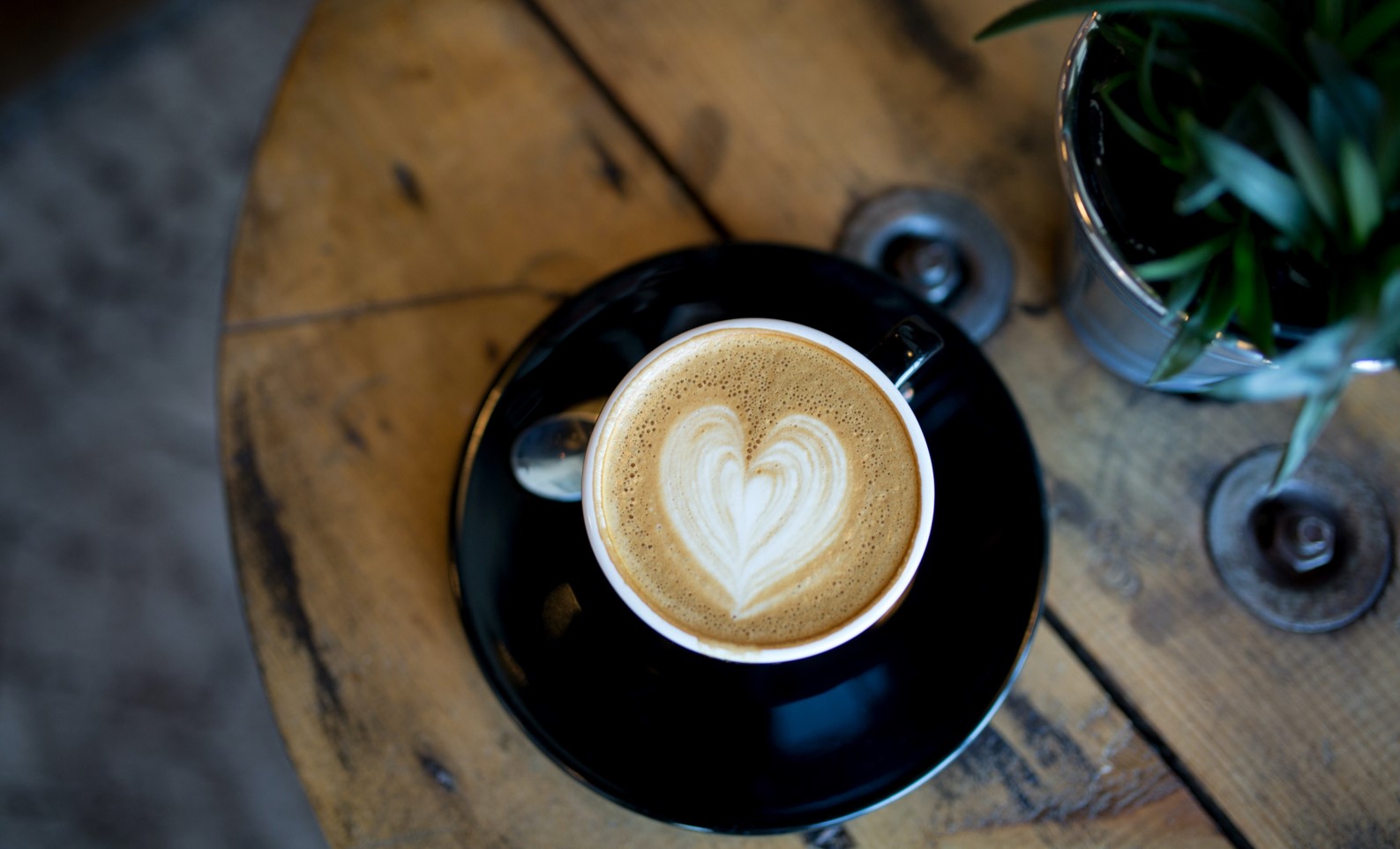 Latte coffee with heart in the foam