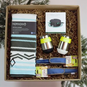 Eco friendly picnic gift box set with recycled blanket, tumblers, silverware and solar light