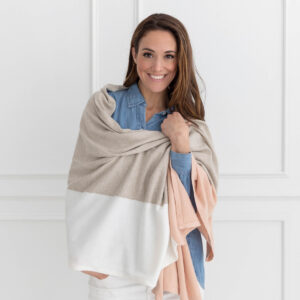 Woman in eco-friendly, organic cotton pink colorblock scarf
