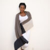 Woman in organic cotton brownstown colorblock travel scarf from Zestt Organics
