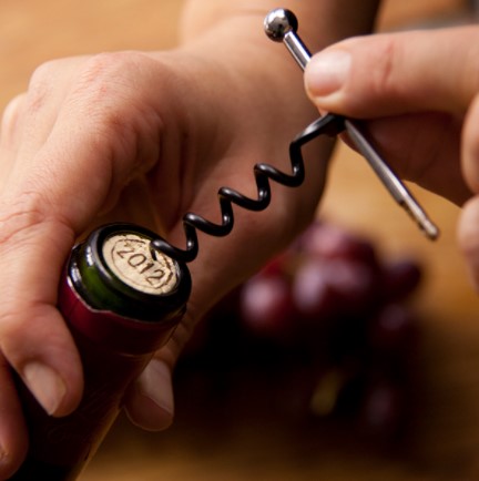 Twistick shown uncorking a bottle of wine.