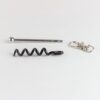 The Twistick travel corkscrew comes with a full-size corkscrew helix, a stainless steel bar, and a keychain attachment. Each part is less than 3 inches long.