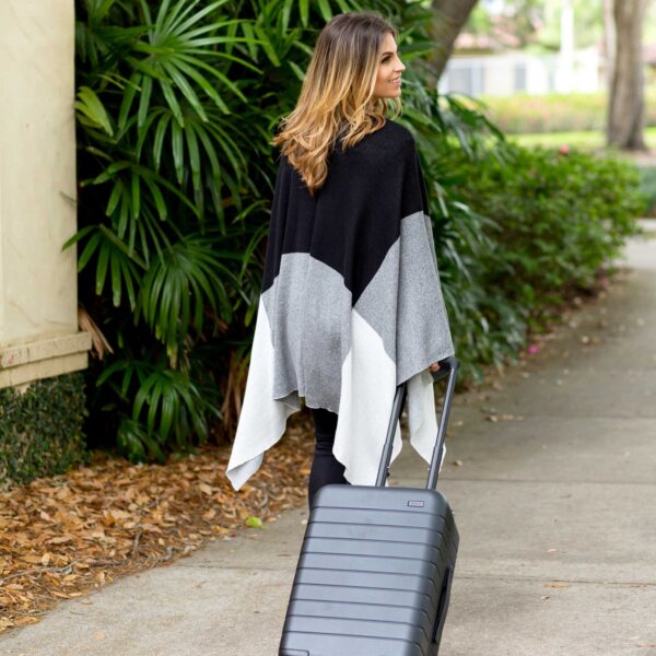 Woman traveler walking wearing organic cotton travel wrap