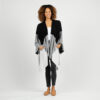 Woman in eco-friendly travel clothing, the black and grey colorblock wrap of organic cotton