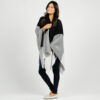Woman in sustainable, organic cotton travel cape