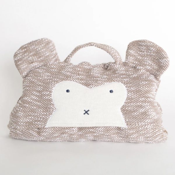 This kid's travel blanket with monkey hood is made of organic cotton. The blanket rolls up into the hood to make for a cute and transportable monkey pillow!