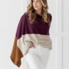 Person wearing organic cotton blanket scarf