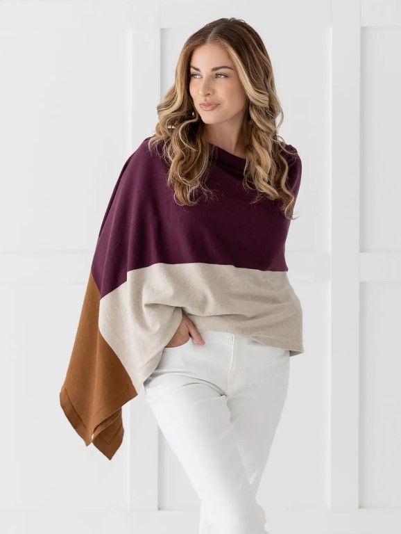 Person wearing organic cotton blanket scarf