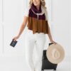 Woman traveler wearing organic cotton scarf for sustainable travel