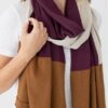 Close up on woman wearing organic cotton travel scarf