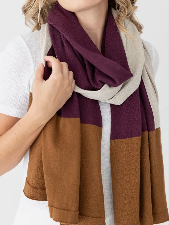 Close up on woman wearing organic cotton travel scarf