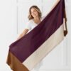Female showing full length of mulberry organic cotton travel block scarf