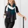 Female traveler with sustainable blanket scarf