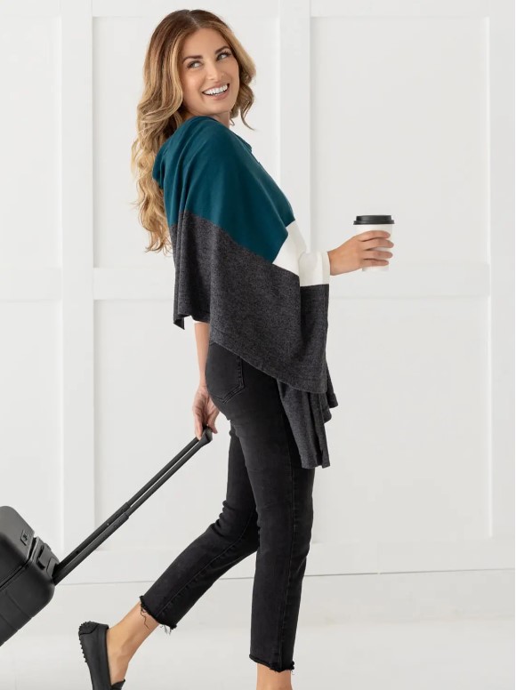 Female traveler in teal colorblock organic cotton scarf