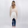 Back view of woman in ivory colorblock eco-friendly, organic cotton travel wrap