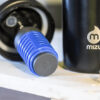 An up-close photo of the Mizu everyday water filter that lives inside of a Mizu stainless steel water bottle.