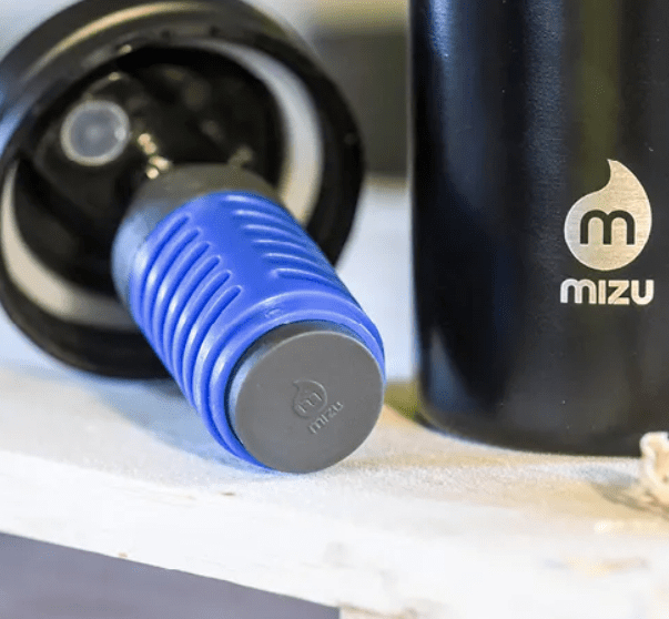 An up-close photo of the Mizu everyday water filter that lives inside of a Mizu stainless steel water bottle.