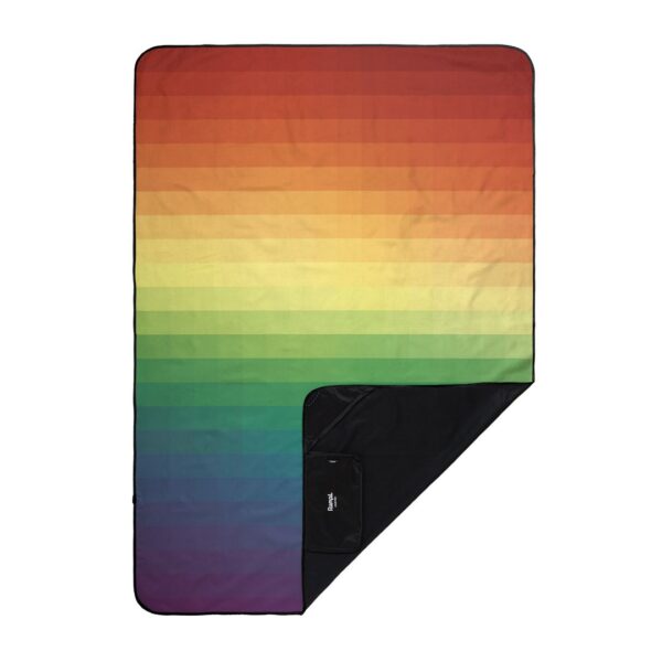 The stash mat by Rumpl in Rainbow Fade is an eco-friendly option, made from 100% post-consumer recycled materials. Shown with a rainbow colored pattern and attached carrying case.