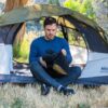 Man in camping tent with eco-friendly stuffable pillowcase