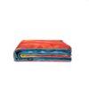 The original rumpl puffy blanket in geo is shown with a geo rainbow front, blue back, and blue binding; made from 100% post-consumer recycled materials.