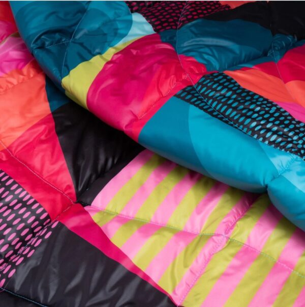 Close up of Chromatic Voyage sustainable camping blanket from Rumpl
