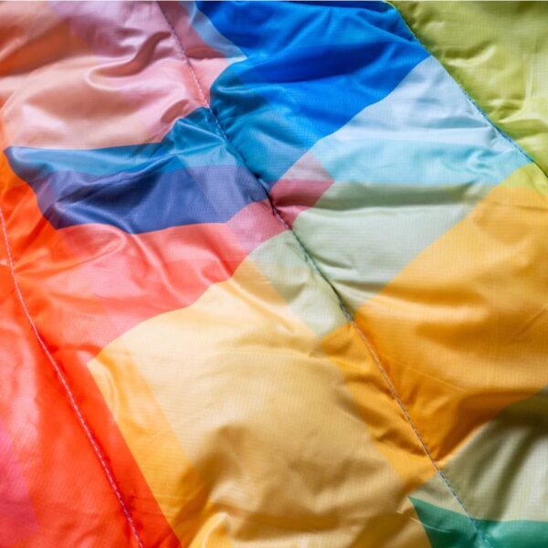 Close up of Geo print for sustainable, recycled, down alternative travel blanket