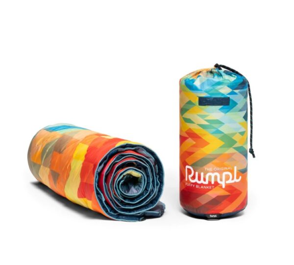 Carry travel bag for recycled down alternative puffy blanket in Geo print