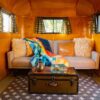Sustainable Geo puffy blanket of down alternative in airstream camper van