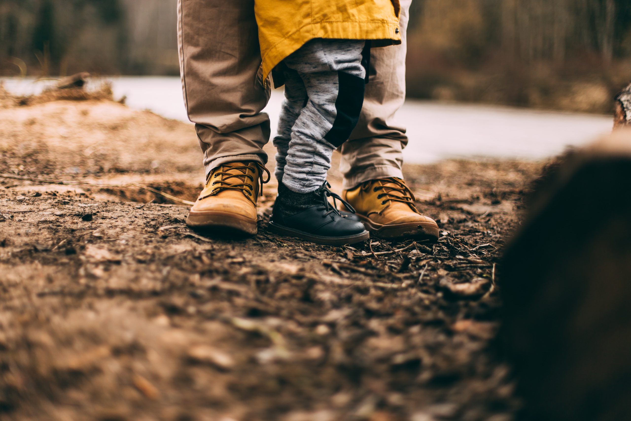 Dad standing outdoors with kid for eco-friendly fathers day gift guide