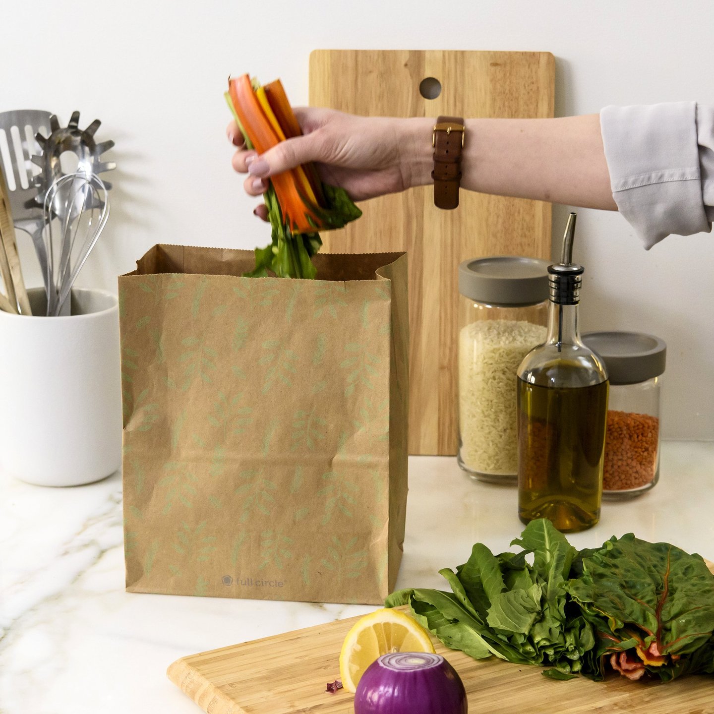 FULL-CIRCLE-COMPOST-BAG-8 Planet friendly 1.5 gallon home composting bag of recycled kraft paper on counter