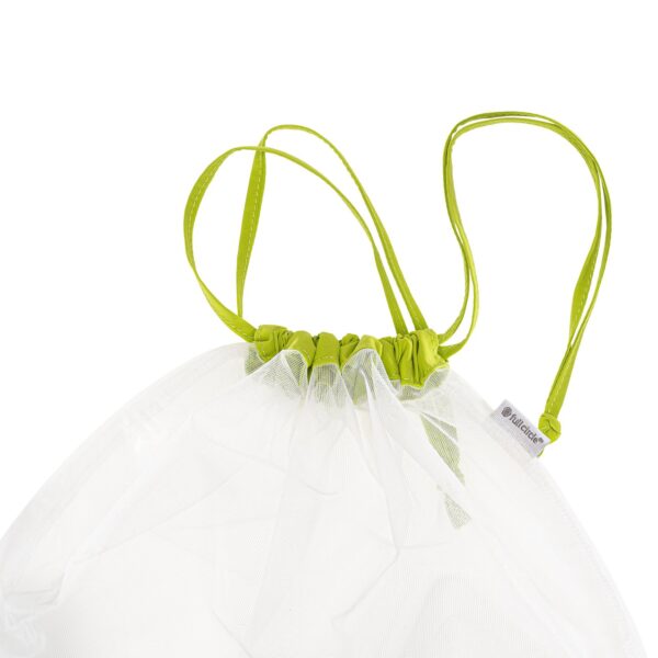 View of green drawstring on recycled, reusable mesh produce bag for low waste grocery shopping