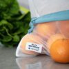 Oranges in recycled, reusable produce bag from Full Circle Home for zero waste shopping