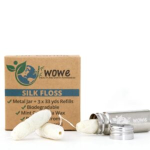 Wowe Lifestyle natural floss is made from 100% biodegradable, sustainably sourced silk. Photo shows plain brown box, stainless steel floss dispenser, and the 3 floss refills included.
