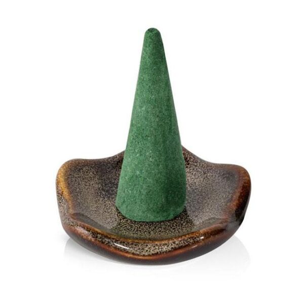 Natural, plant-based mosquito repellent incense cones on outdoor table from Murphy's Naturals
