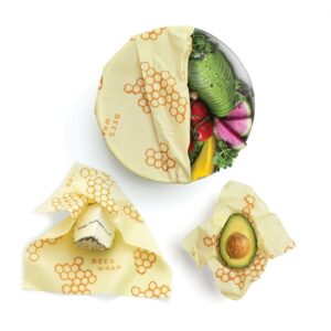 The 3 pack of Bee's Wrap food wraps comes in three different sizes, small, medium, and large. Shown here wrapping up a salad, cheese, and an avocado.