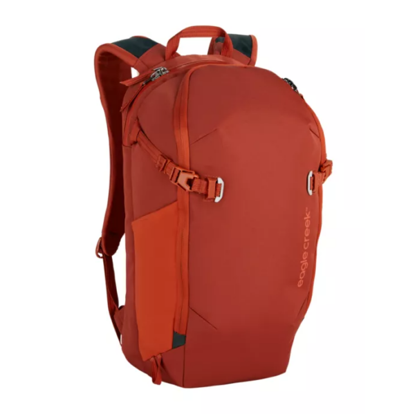 The Explore 26L backpack by Eagle Creek, made sustainably from recycled textile fabric, is shown here in midnight sun red, with external compression straps.