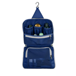 The earth-friendly Pack-It Reveal Hanging Toiletry Kit, shown here in blue, has many interior pockets and mesh zippered compartments. Made from 100% recycled materials.