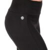 Model is wearing the eco-friendly black happy hour pants by JJWinks, with slimming side panel and a no muffin top four inch waist band.
