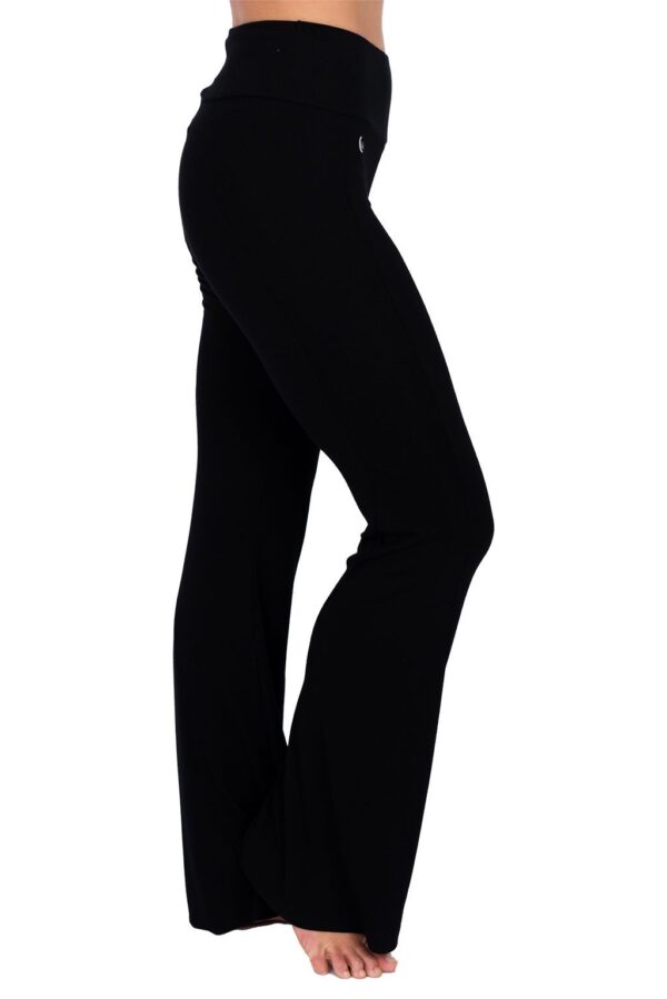 Model is wearing the earth-friendly black happy hour pants by JJWinks, with slimming side panel and a no muffin top four inch waist band.